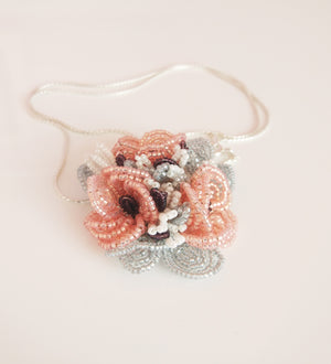 Handmade beaded flower pendant
