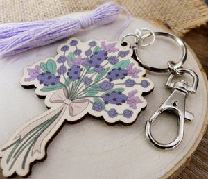 close up of lavender key chain with light purple tassel
